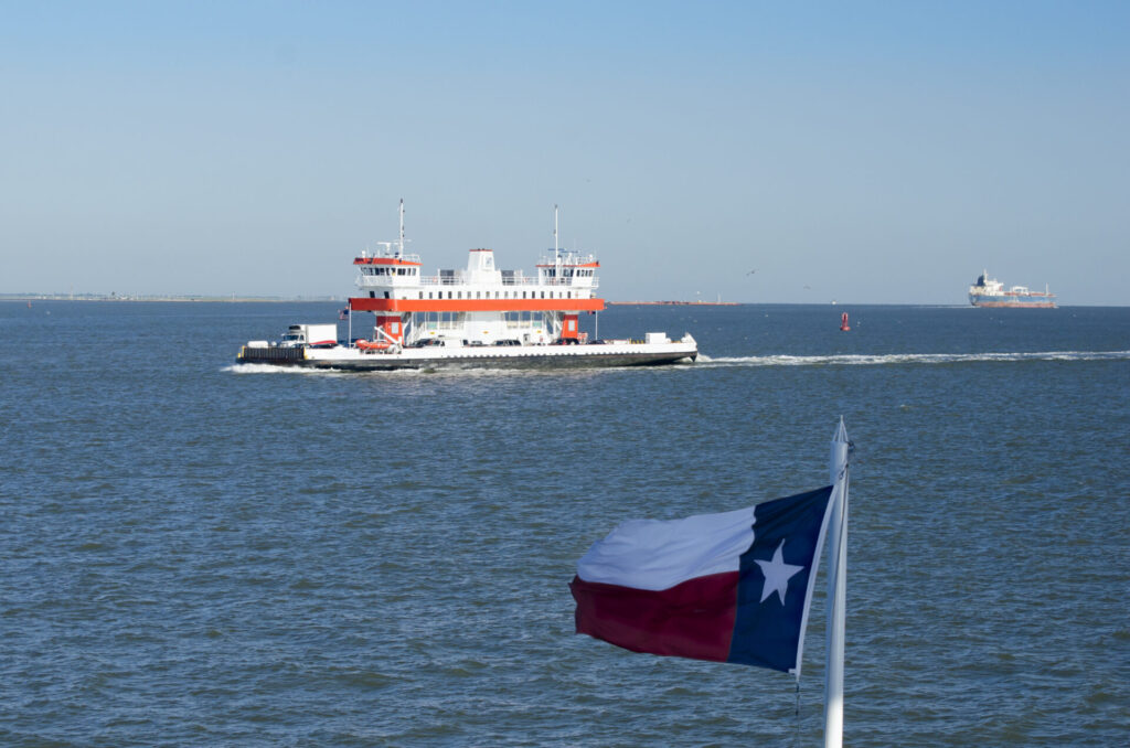 Port Houston Adds New Hybrid RTG Cranes, Tour Boat Vessel for Continued Growth 2 Ferry Boat And Large Ship On Houston Shipping Channel